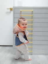 load image into gallery viewer, Baby standing in front of a white cabinet, wearing a quilted jacket.